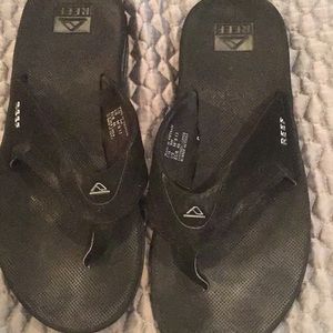 Black reef sandals. Worn once on beach wedding